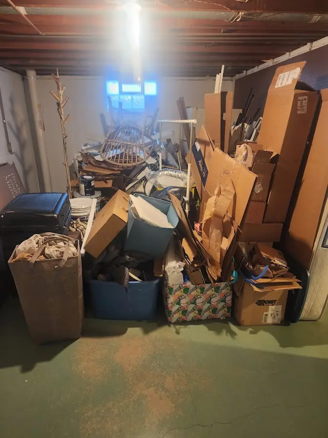 Roll-off dumpster container at job site for Yard Waste Dumpster Rental in Shorewood Forest